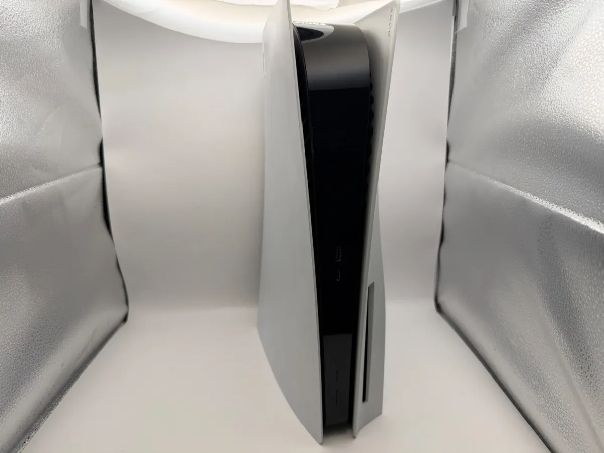 Original PS5 with disc drive, standing upright